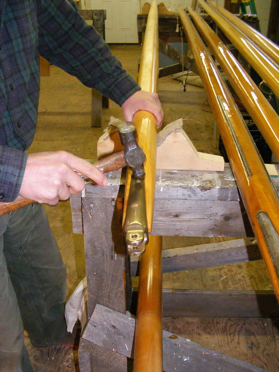 Ted Crosby, (his grandfather and Ned’s great grandfather were brothers), installing gaff hardware for a Wianno Senior.