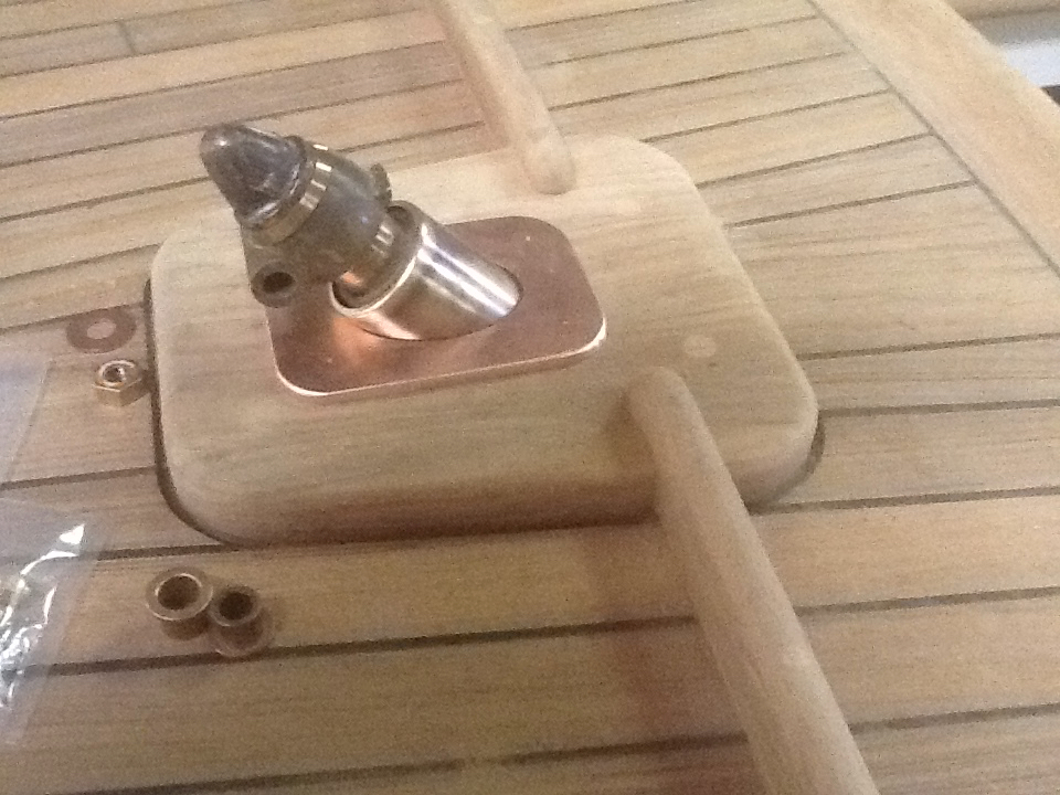 Tiller head hardware…original collar and nut…our bronze deckplate
