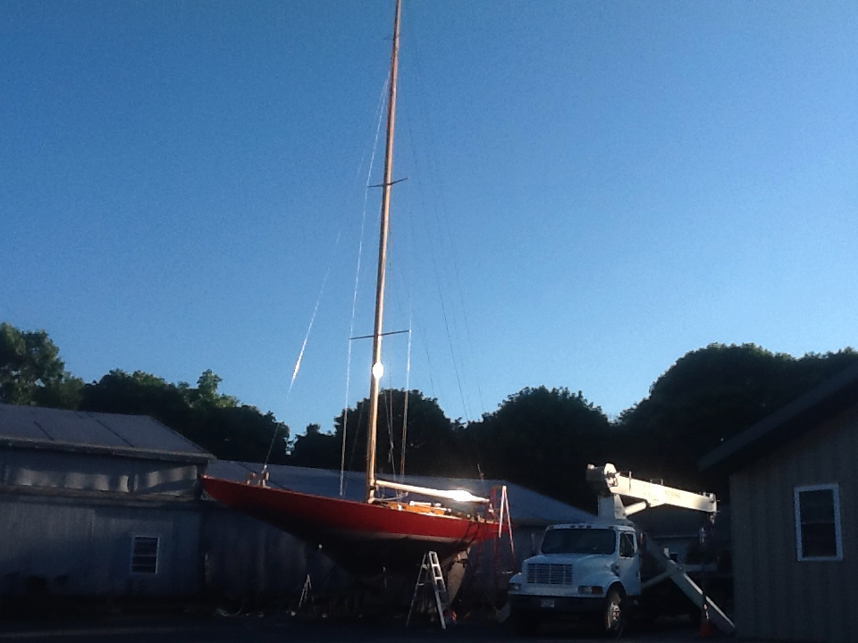 Stepping her mast for the first time and assembling her rig.